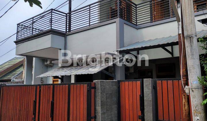 RUMAH CANTIK TERAWAT SEMI FURNISH DI SAWANGAN 1