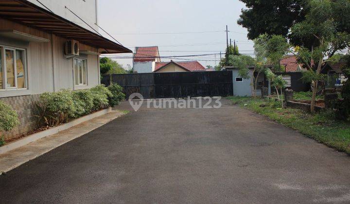 Tanah sekaligus bangunan (untuk gudang dan kantor) 1