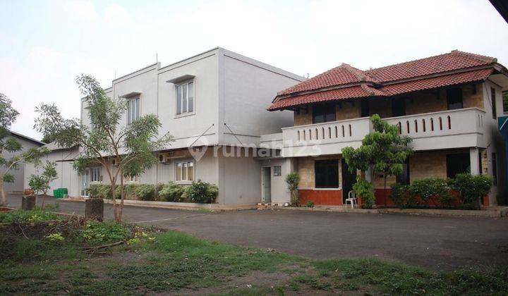 Tanah sekaligus bangunan (untuk gudang dan kantor) 2