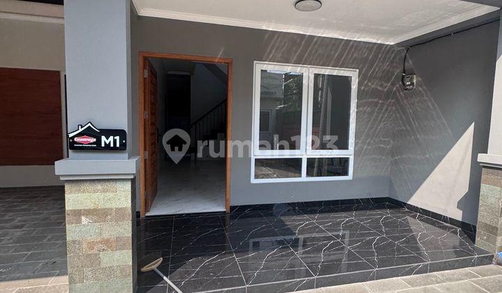 House for Sale in a Cluster in Limo. Depok 2