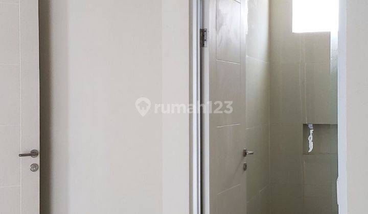 Disewakan! Rumah 2 Lantai Central Park Juanda Semi Furnished 4
