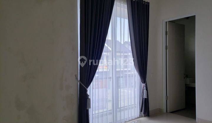 Disewakan! Rumah 2 Lantai Central Park Juanda Semi Furnished 6