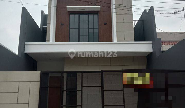 Rumah di Rungkut asri 2 Lantai Baru Utara 1