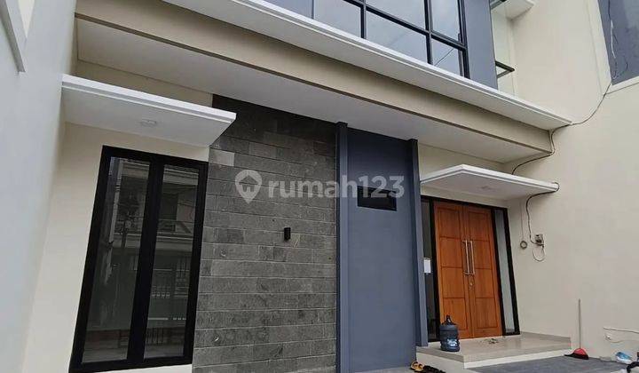 RUMAH 2 LANTAI MANYAR SURABAYA LEBAR 8 2