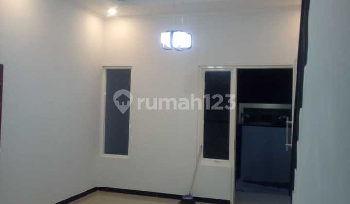 Rumah Kondisi baru 2 lantai 100m dari Jl Majapahit di Menjangan  2