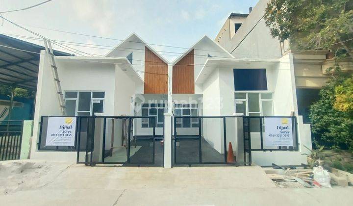 Rumah Baru Modern Tropis di Harapan Indah 1