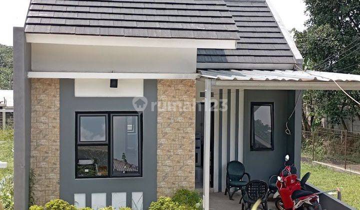 Dijual rumah dekat dengan jalan raya bisa dijadikan investasi  1