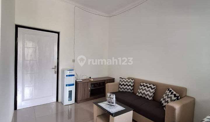 Dijual rumah dekat dengan jalan raya bisa dijadikan investasi  2