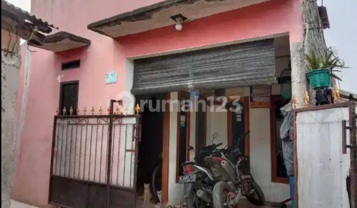 Dijual  2 rumah jadi 1 Harga Bagus & strategis SHM di Limo, Depok 1
