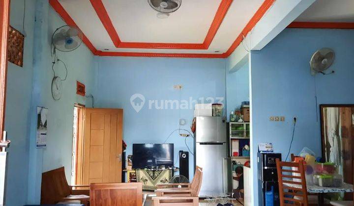 dijual rumah+kost"an+kios di pondok ungu permai sektor v  2