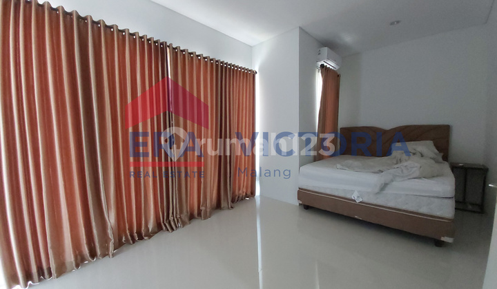 Di sewakan rumah 2 lantai full furnish + kanopi, selangkah ke jalan poros soehat, dekat kampus Polinema, UB 4