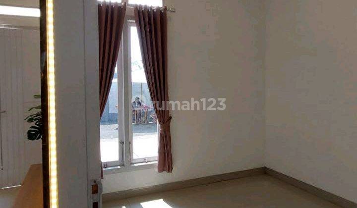 kamar tidur rumah cluster siap huni di
