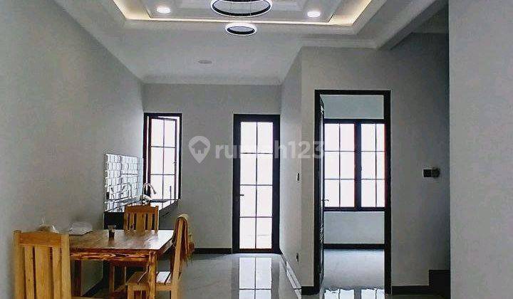 ruang makan rumah cluster 2 lantai siap