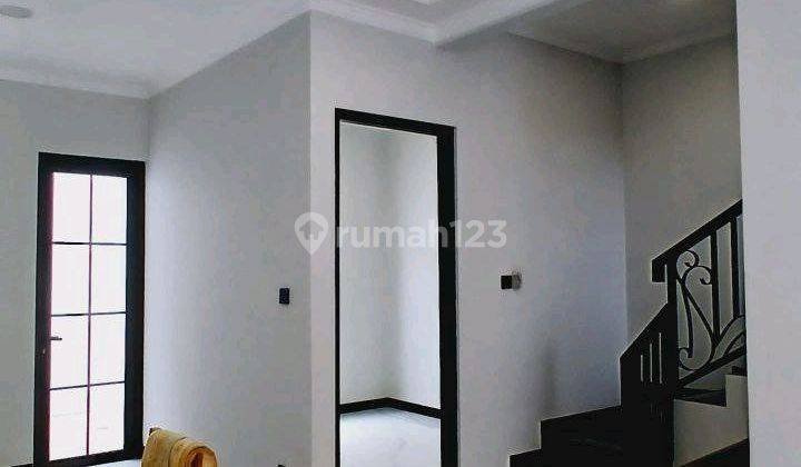 ruang tamu rumah cluster 2 lantai siap