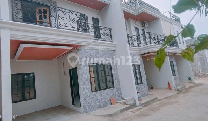 Rumah 2.5 Lantai ( Rooftop ) Dekat Tol Cijago