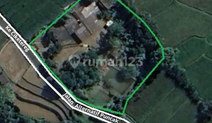 Tanah dengan Rumah di Areal Persawahan