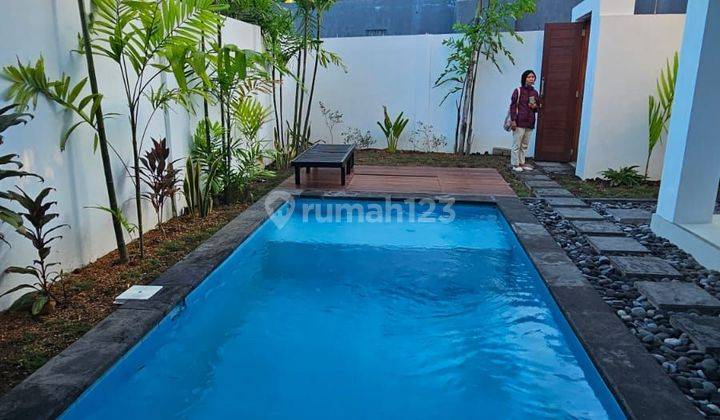 Semi-furnished villa for annual rental in strategic location in Canggu 2