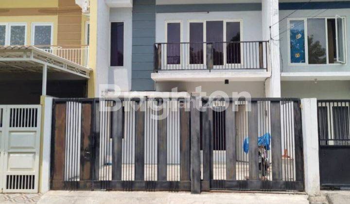 RUMAH GREEN MANSION REGENCY KONDISI TERAWAT SIAP HUNI 1