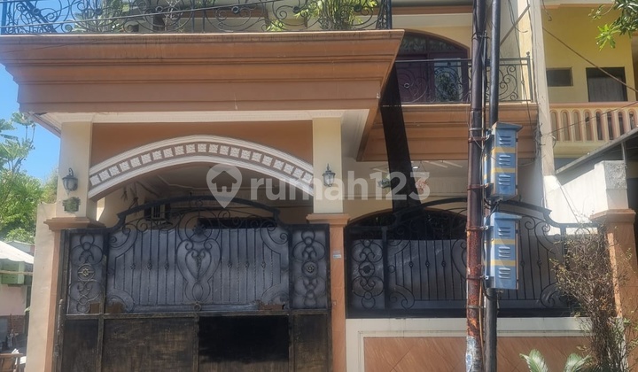 Two-Story Dukuh Kupang House with Hook Position and Fish Pond 1