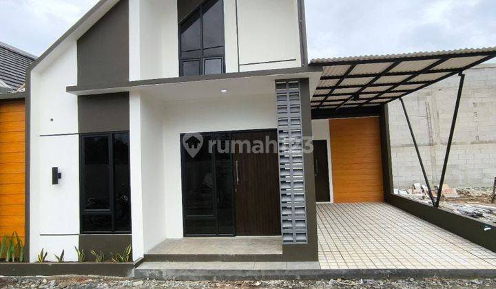 Rumah Modern Model Mezzanine Konsep Cluster 1