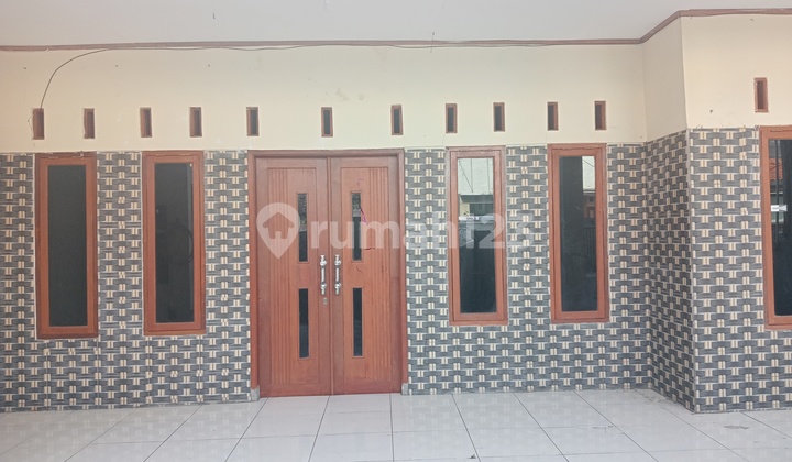 Rumah Pusat Kota Sayap Pungkur / Moh Ramdhan