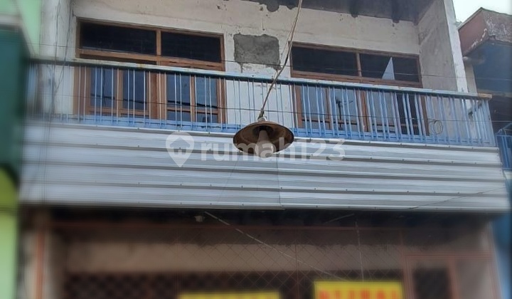 Rumah Tinggal di Pusat Kota Pusat Usaha