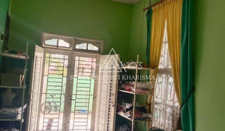 Di  Rumah Daerah Amplas komplek Taman Riviera