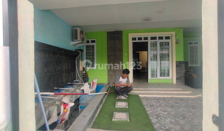 over credit pasar kemis 3