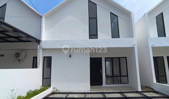 Rumah terbaru type Mezanine 3 KT Sisa 1 unit rumah di komplk daerah ringroad setiabudi flamboyan kota Medan