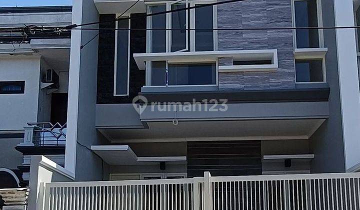 Rumah Baru di Nginden Intan, Modern Minimalis 1