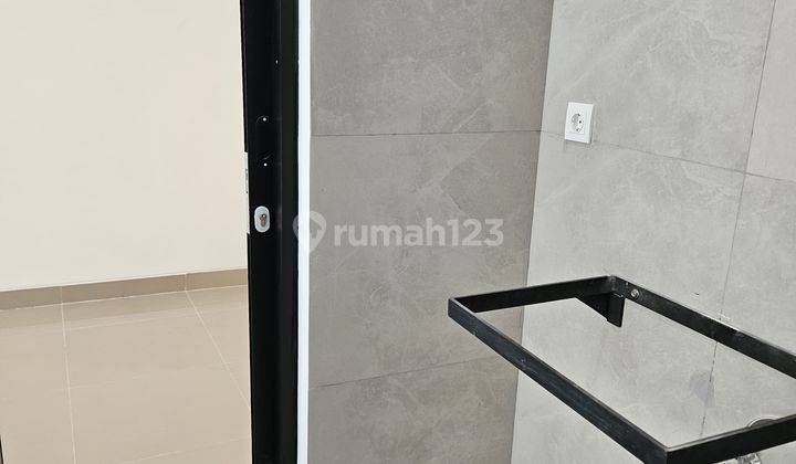 Di  rumah baru 3 unit  dalam cluster  mertilang sektor 9 bintaro 2