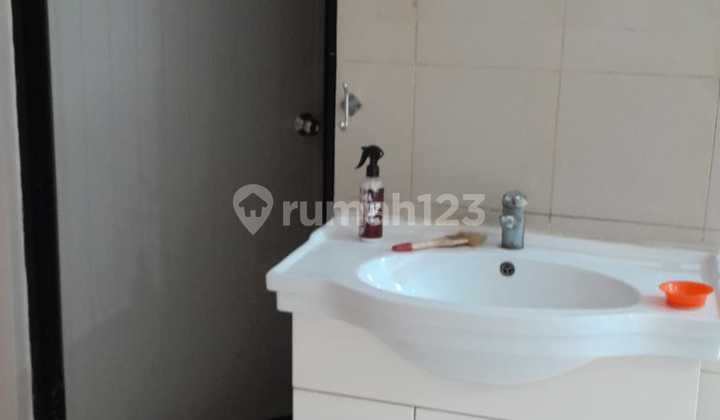 Rumah tua Pluit 10x20 1 1/4 lantai SHM 2