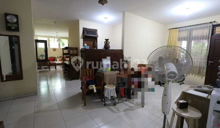 FOR SALE COMFORTABLE HOUSE IN A SERENE AND STRATEGIC LOCATION RAFFLES HILLS CIBUBUR