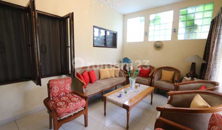 FOR SALE COMFORTABLE HOUSE IN A SERENE AND STRATEGIC LOCATION RAFFLES HILLS CIBUBUR