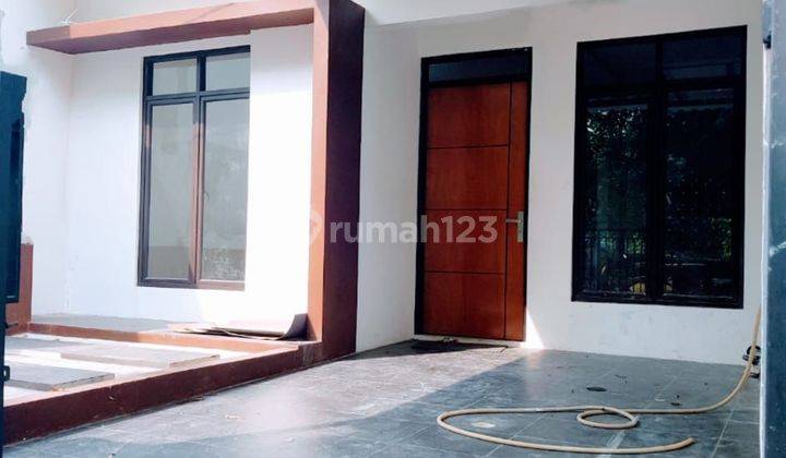 Rumah Minimalis Hadap Utara Dalam Cluster Di Graha Raya 2