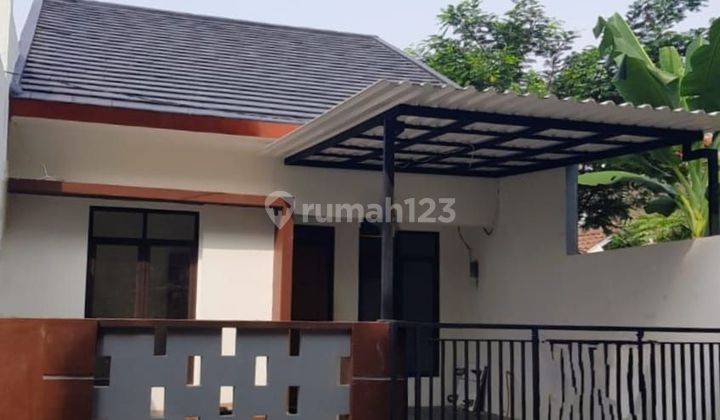 Rumah Minimalis Hadap Utara Dalam Cluster Di Graha Raya 1