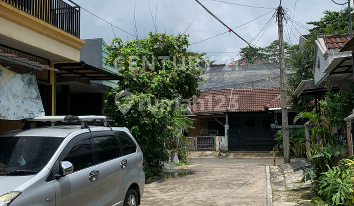 tampak depan rumah hitung tanah di perumahan