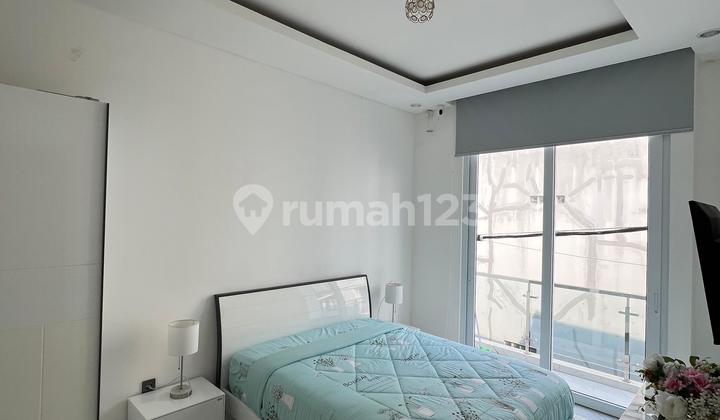 Rumah Modern Minimalis di Kebon Jeruk S8741 2