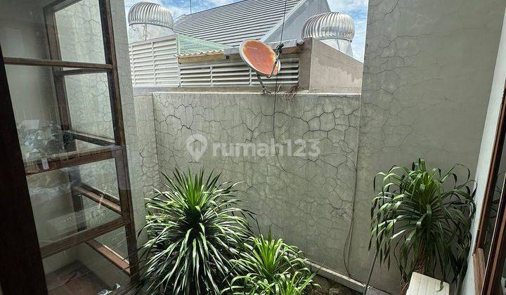 Dijual Rumah Minimalis Tropical Citraland Utama Surabaya Barat 2