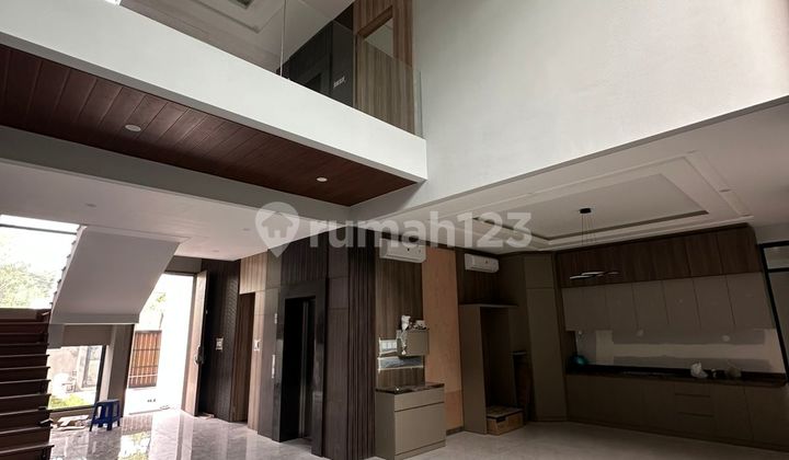 Modern Tropical 3 Floors! Private Elevator! Semi-Furnished Citraland Surabaya 2