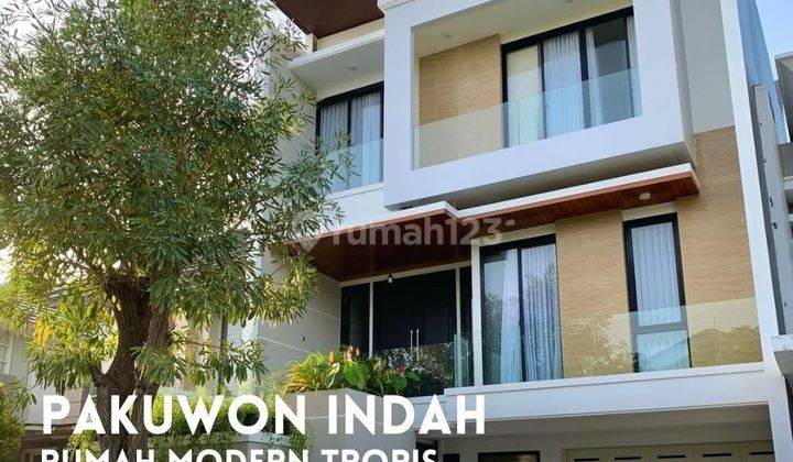 Rumah 2 Lantai Bagus Semi Furnished di Pakuwon Indah Dekat Citraland Graha 1