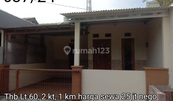 Rumah Minimalis Kondisi Rapi di Taman Harapan Baru 22104 Mar 1