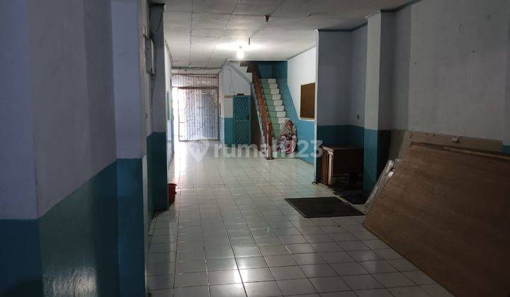 Rumah Pinggir Jalan Bekas Sekolah di Taman Harapan Baru 22086 Er 2