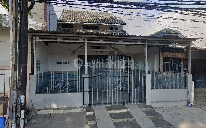 Rumah Pinggir Jalan Bekas Sekolah di Taman Harapan Baru 22086 Er 1