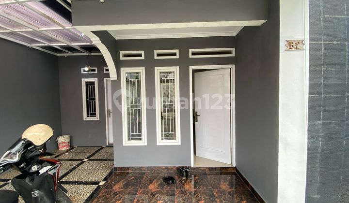 Rumah Dalam Cluster Siap Huni Area Tanah Baru Beji 15 Menit ke UI 2