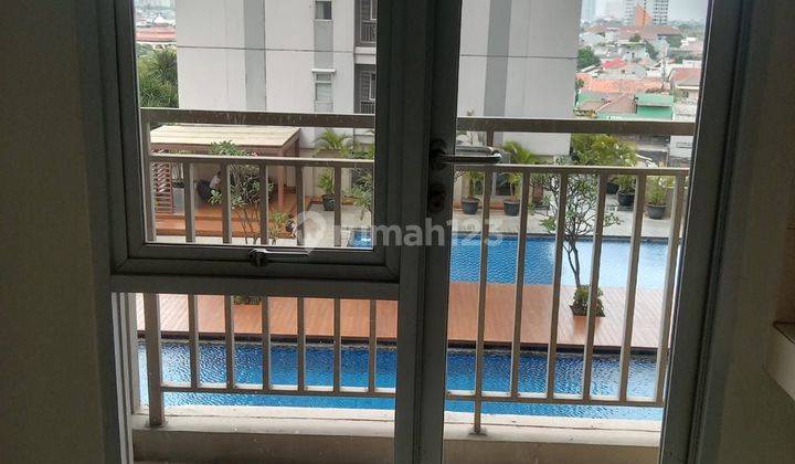 Apartemen Jual Oakwood Residences 2BR Semi Furnished 1