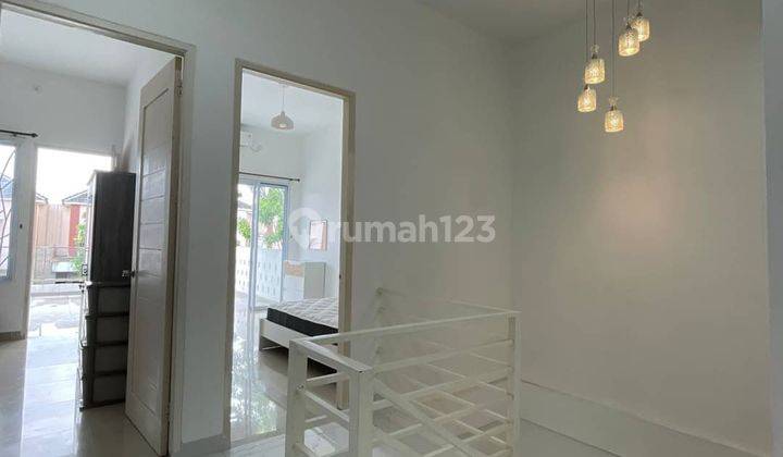 DISEWAKAN RUMAH PLAMO RESIDENCE 2 LANTAI DEKAT FULL FURNISHED 10