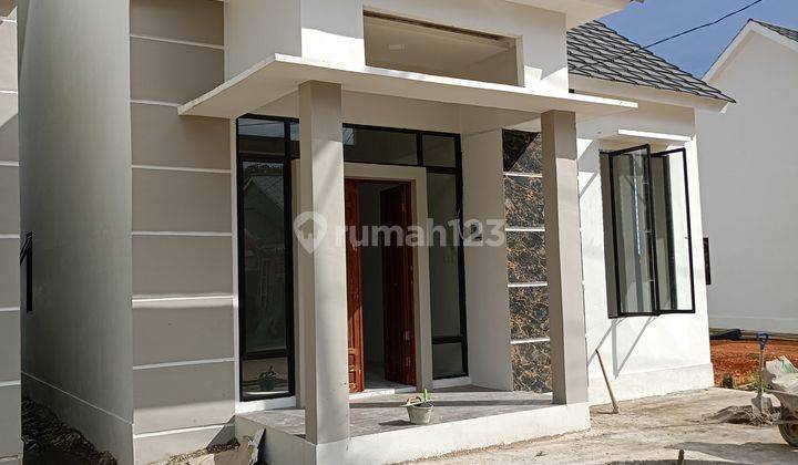 Rumah baru 1 lantai desain minimalis modern di dekat kota 2