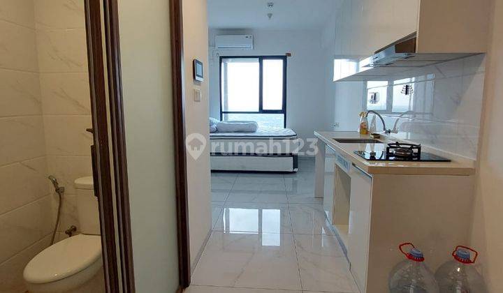 Jual Apartemen Studio Semi Furnished di Sky House Tower Acacia 1