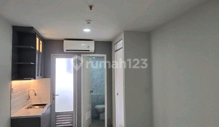 Very Cheap Sale: Nias Apartment in Klp Gading, Chrisant Tower, 25th Floor, 36 sqm, 2 Bedrooms, 1 Bathroom, Windows in Each Room, Renovated, Semi-Furnished, AC, Ready to Use, Open View, PPJB Ready for SHM, Price 225 Million Negotiable.